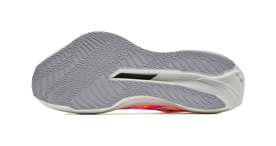 Running shoe outsole with textured gray traction pattern