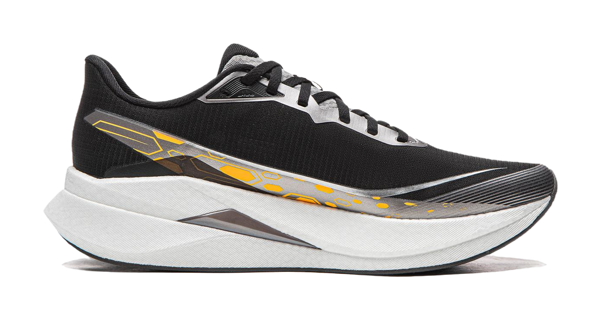 Black running shoe side view with white-gray midsole, yellow-orange logo detailing.