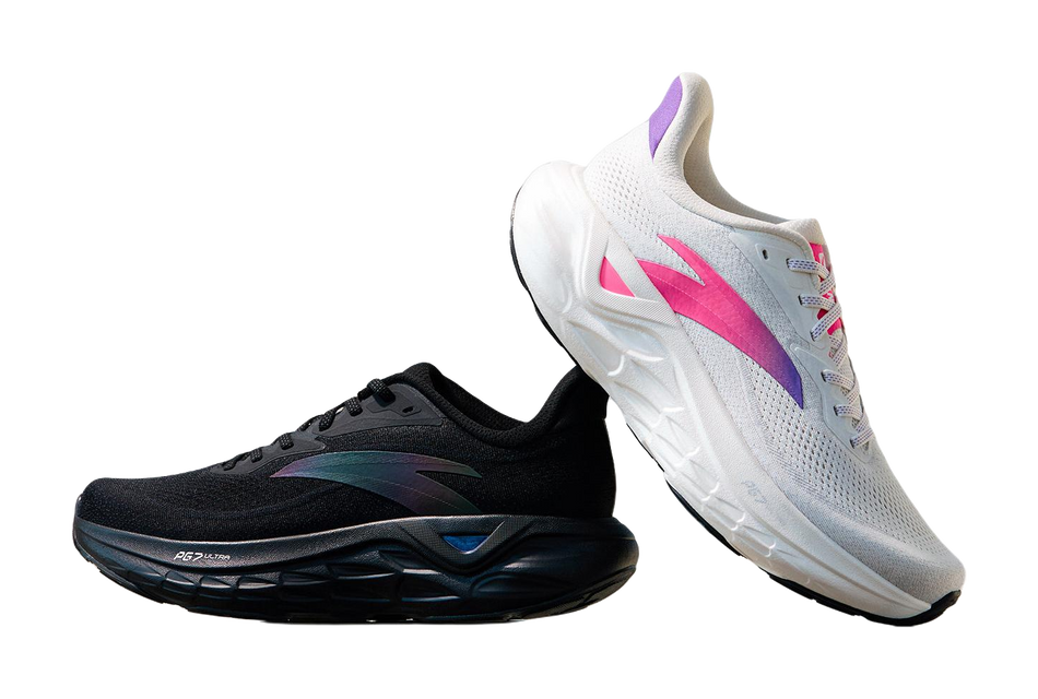 Pair of men's low-top running shoes: black and white colorways with pink/purple details