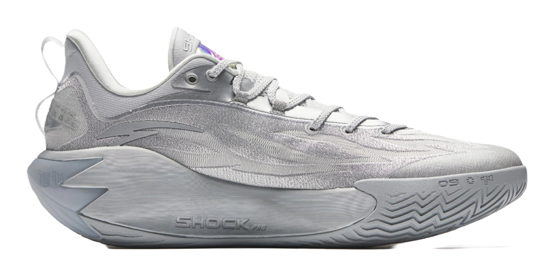 Metallic grey basketball shoe, side view with textured sole and lace-up upper