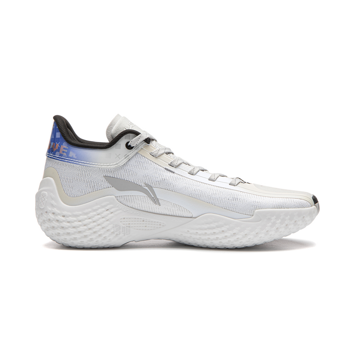 White basketball shoe with black sole edge and blue side panel near collar