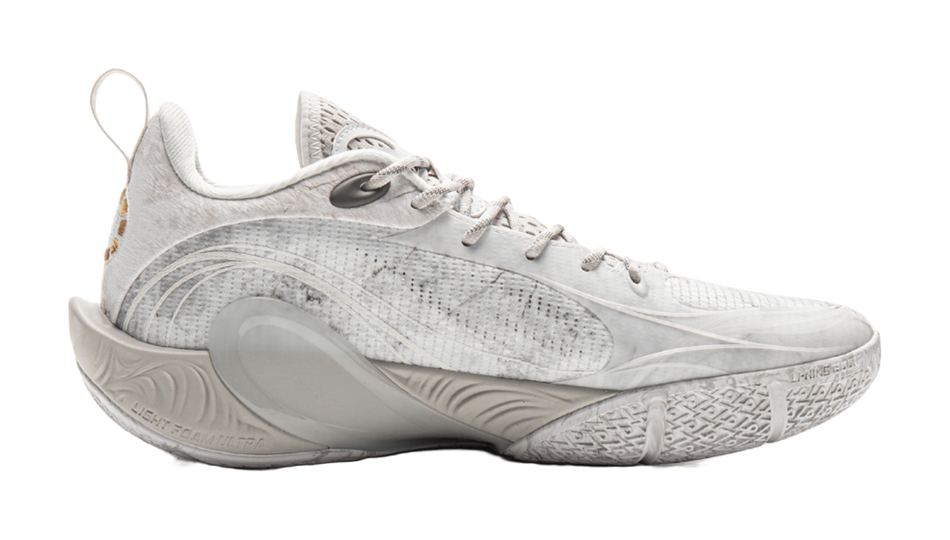 Unisex basketball shoe, side view with speckled white-gray knit upper and thick gray sole