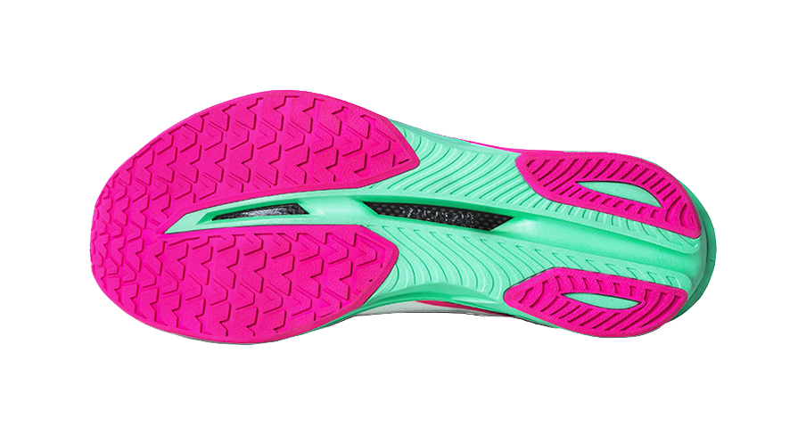 Running shoe outsole with pink tread pattern and teal-green traction areas.