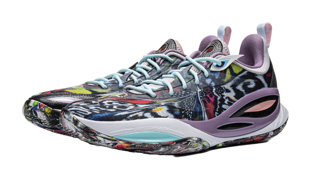 Basketball shoe front 3/4 view, multicolor graphic upper, purple side panel