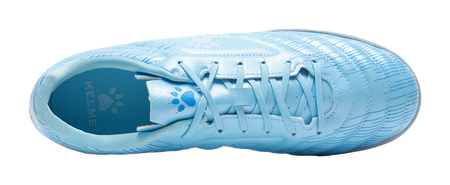 Sky blue unisex TF turf soccer shoe top view with KELME and paw-pattern accents
