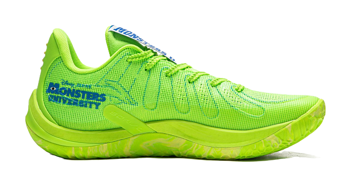 Green basketball shoe side view with patterned mesh upper and thick sole