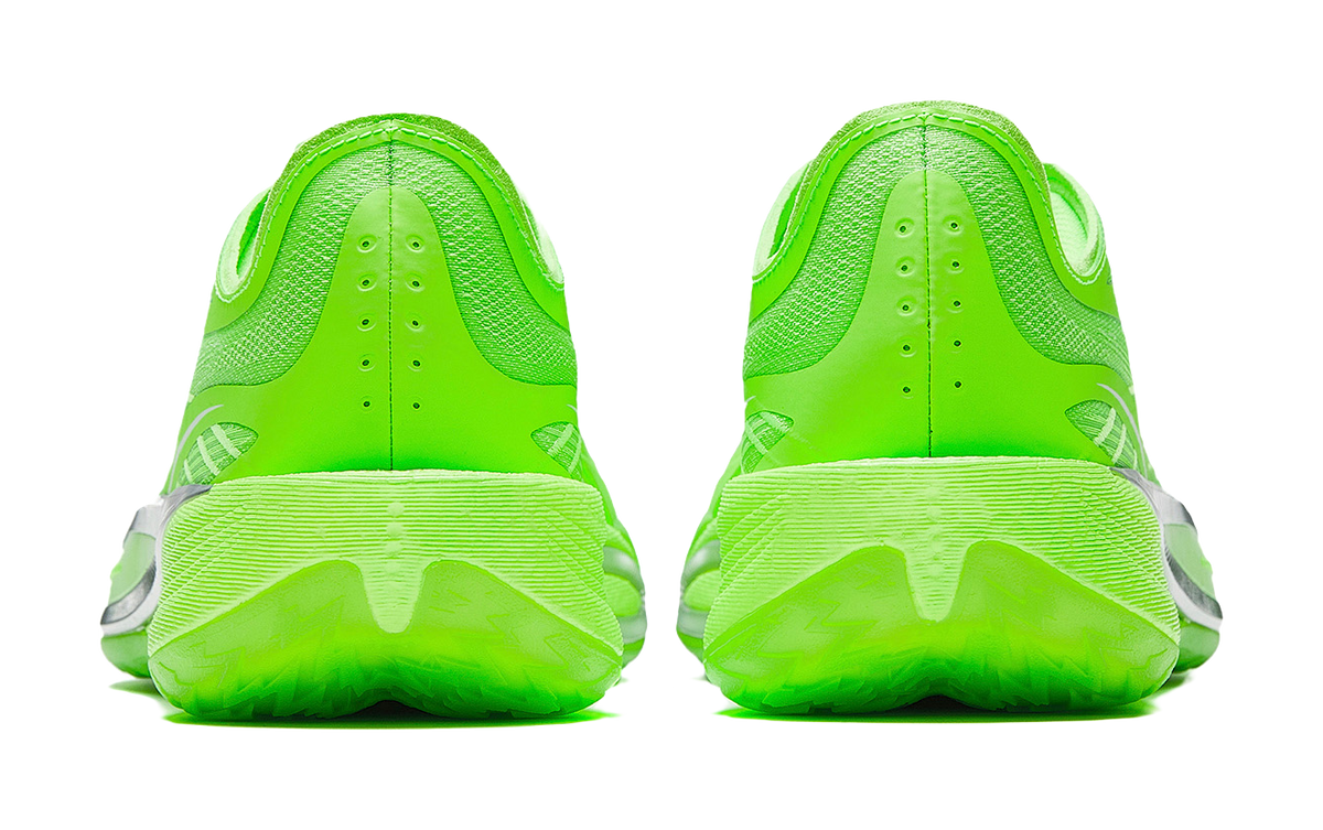 Fluorescent green low-top basketball shoes, back view with heel cushioning and lace loops