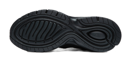 Black rubber outsole with tread pattern and cushioning ridges under running shoe.
