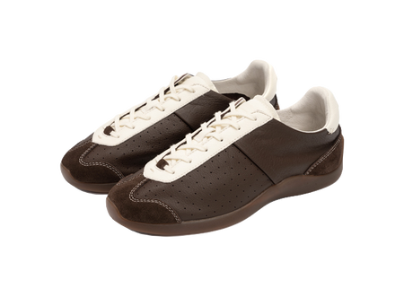 Two brown low-top sneakers with antique white laces and perforated side panels.