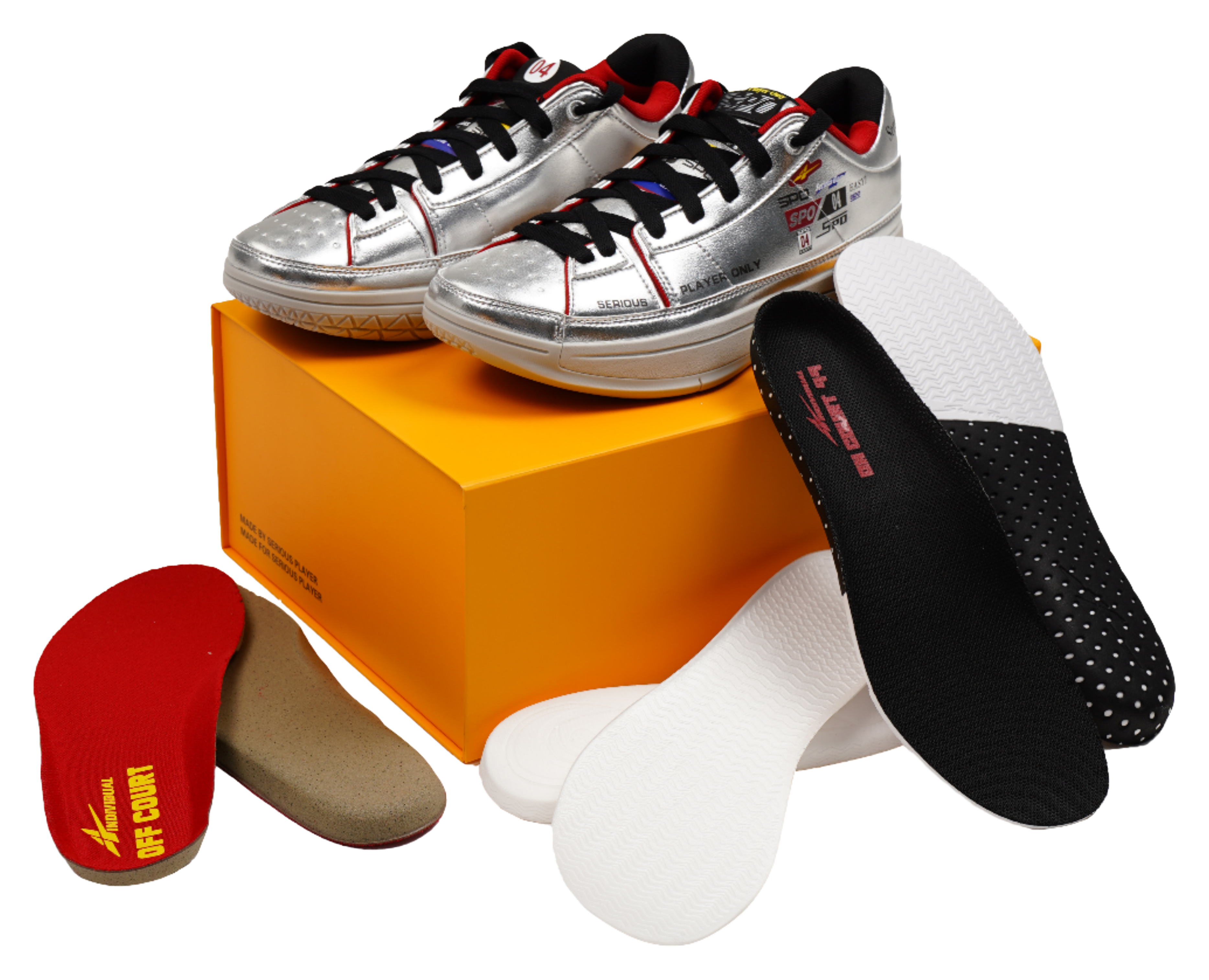 Silver basketball shoes with black and red socks, shown on an orange box