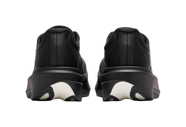 Black low running shoe heels with molded back and dark cushioned sole