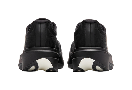 Black low running shoe heels with molded back and dark cushioned sole