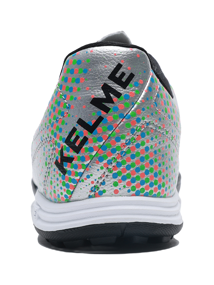 Silver unisex TF turf soccer shoe, back view with KELME lettering and multicolor dots