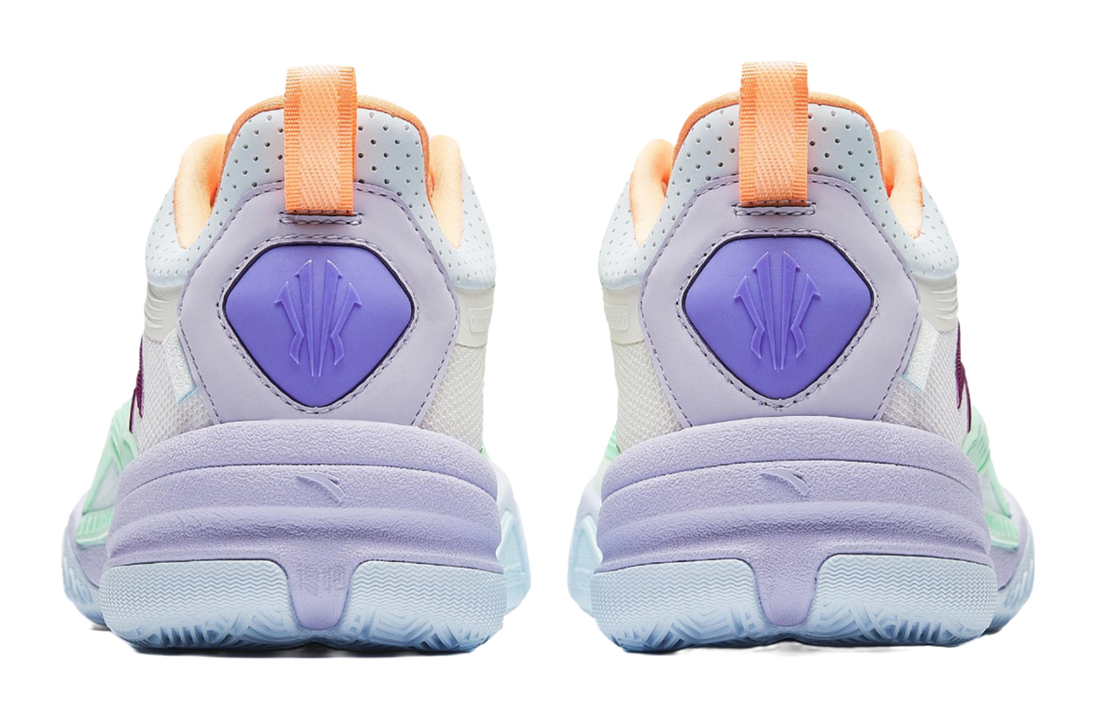 Pair of basketball shoes, lavender heel with logo patch, orange webbing pull, green trim