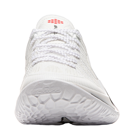White basketball shoe toe with textured rubber outsole and grip pattern.