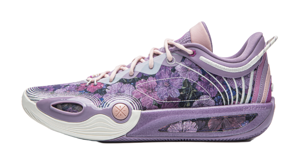 Purple basketball shoe with floral graphic, lace-up front and cushioned midsole.