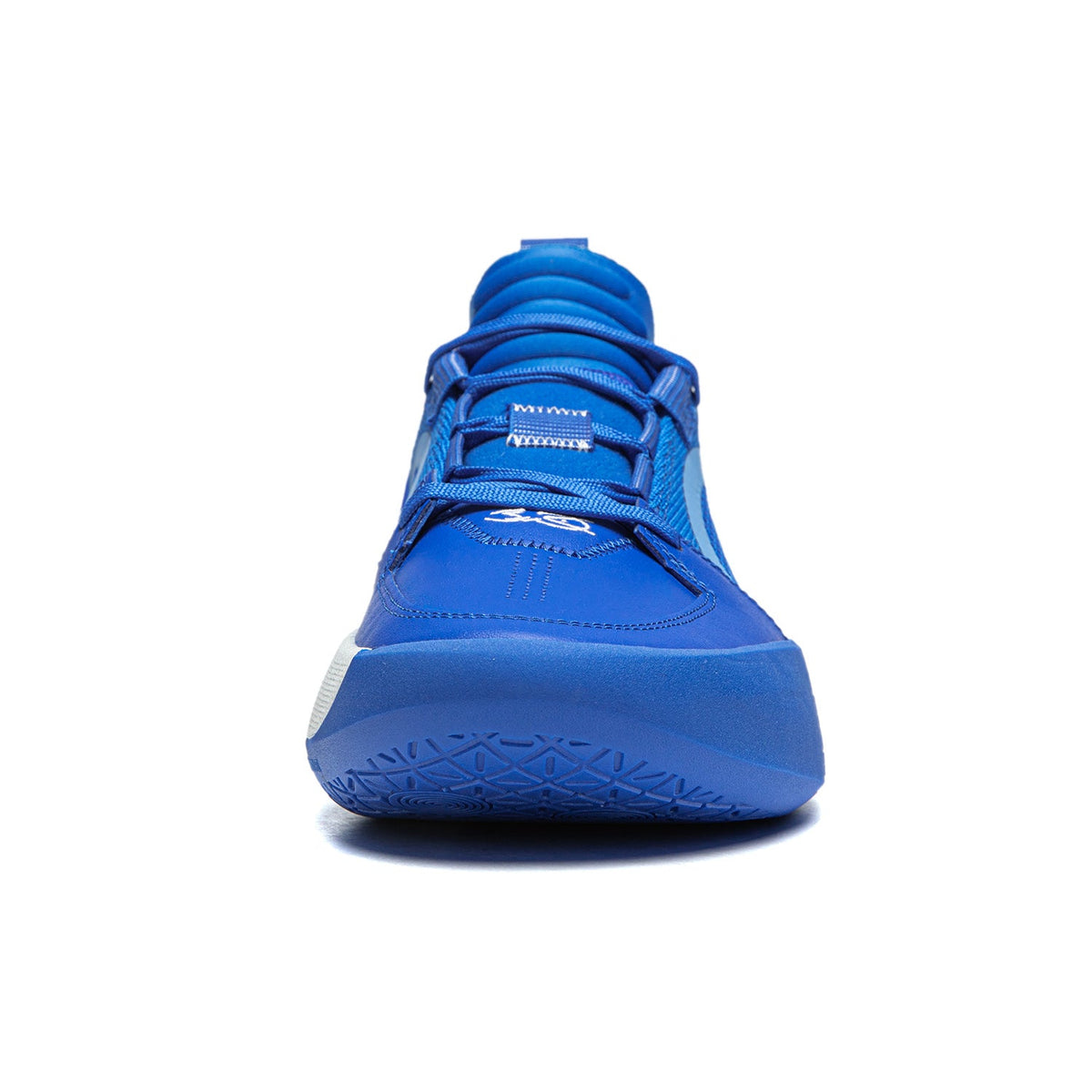Men's basketball shoe bright blue; side front view with lace-up closure and thick sole