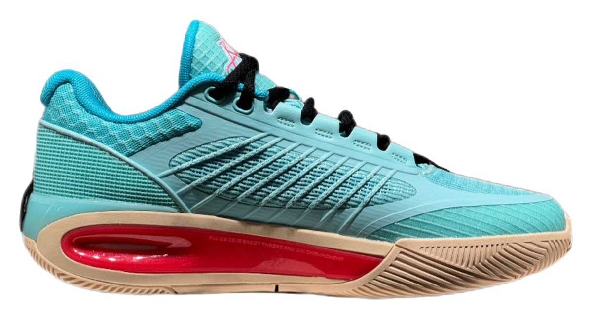 Turquoise low-top basketball shoe side view with black laces and red sole