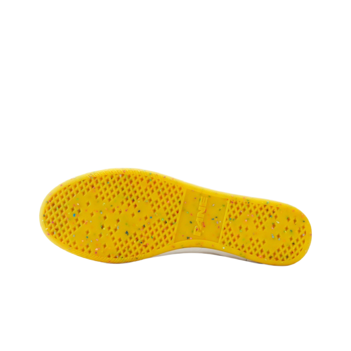 Yellow rubber outsole with textured tread pattern for grip on a low-top shoe