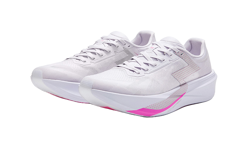 Pair of low running shoes with white uppers and pink side stripes