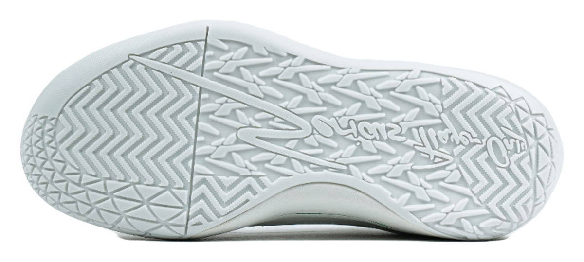 White rubber outsole tread pattern for grip on low-top sneakers