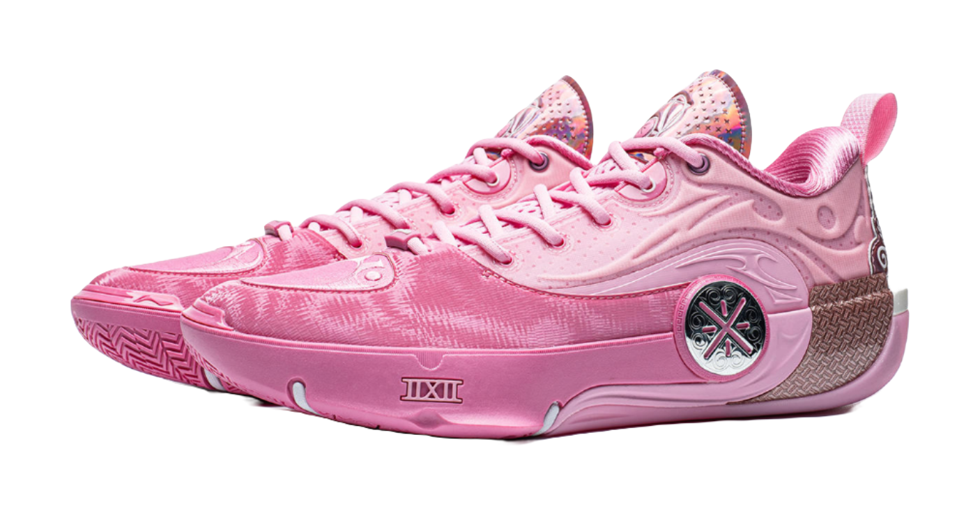 Pink basketball sneaker, front side view with circular emblem and lace-up