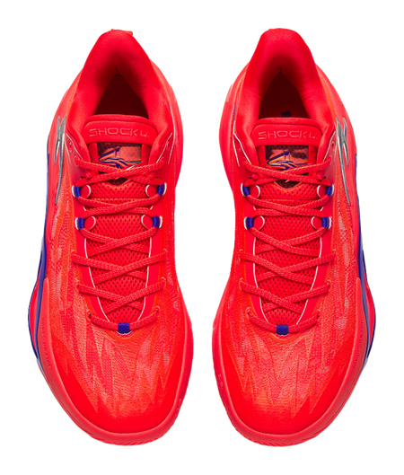 Red basketball shoes, front and tongue view, blue lace accents and cushioned collar