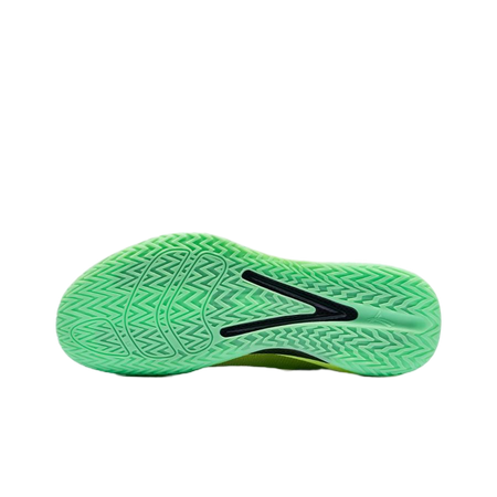 Lime green basketball shoe outsole with textured zigzag tread and black heel mark