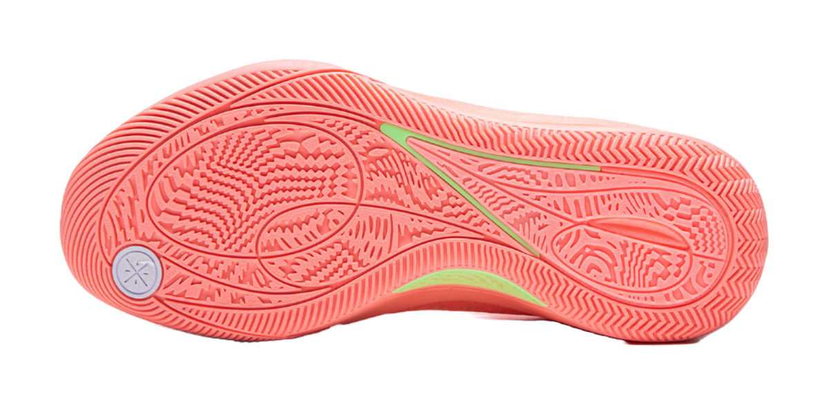 Men's low-top basketball shoes outsole, pink-orange with textured grip and green accent