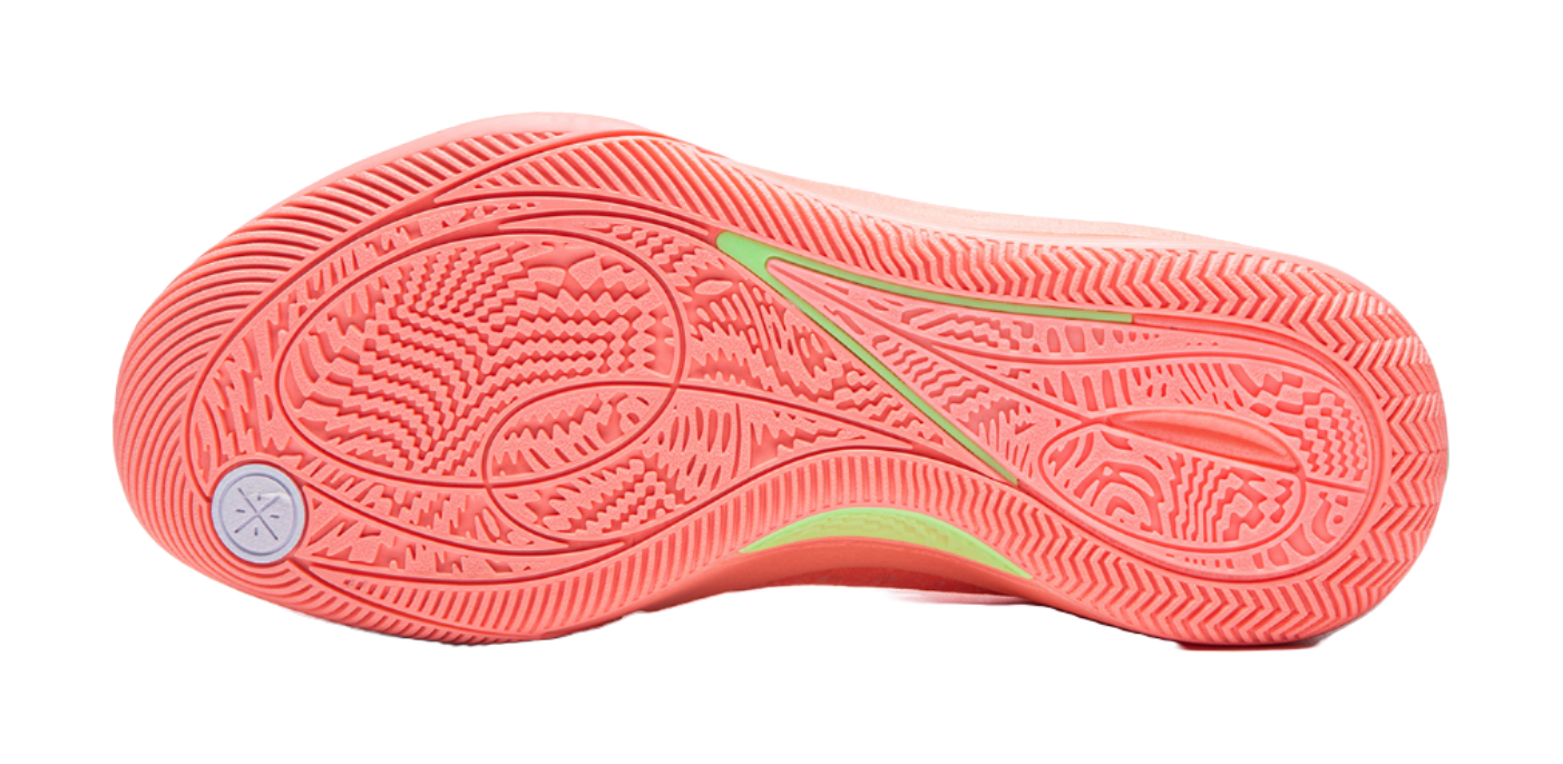 Men's low-top basketball shoes outsole, pink-orange with textured grip and green accent