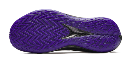 Purple basketball shoe outsole with zigzag traction pattern and oval forefoot cutout