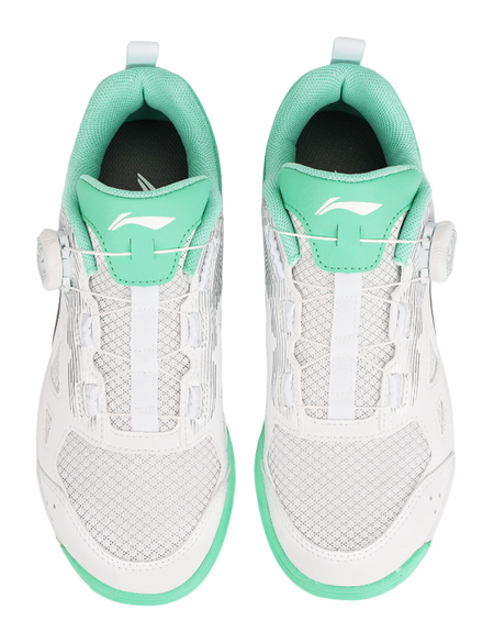 Table tennis shoe pair back view in white with mint-green heel panels and straps