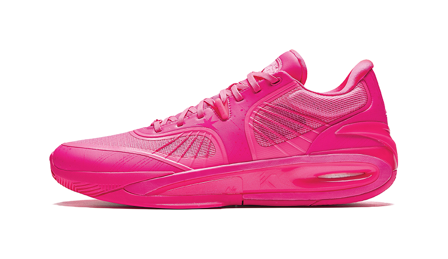Mid basketball shoe in bright pink-red with lace-up front and cushioned sole.