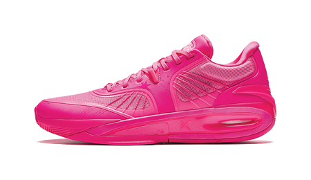 Mid basketball shoe in bright pink-red with lace-up front and cushioned sole.