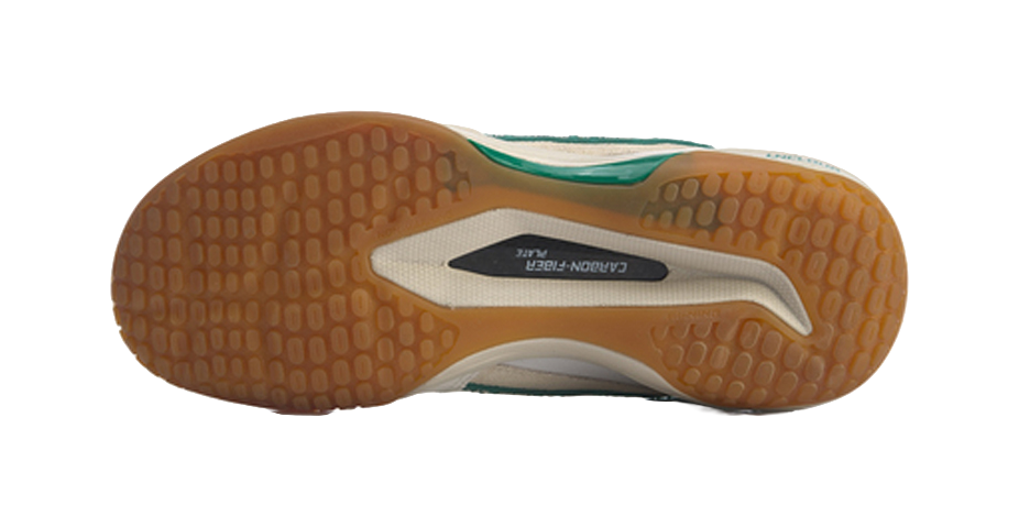 Badminton shoe outsole tread, brown rubber base with green trim