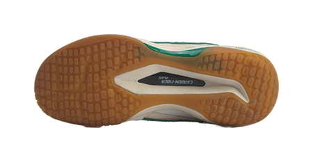 Badminton shoe outsole tread, brown rubber base with green trim