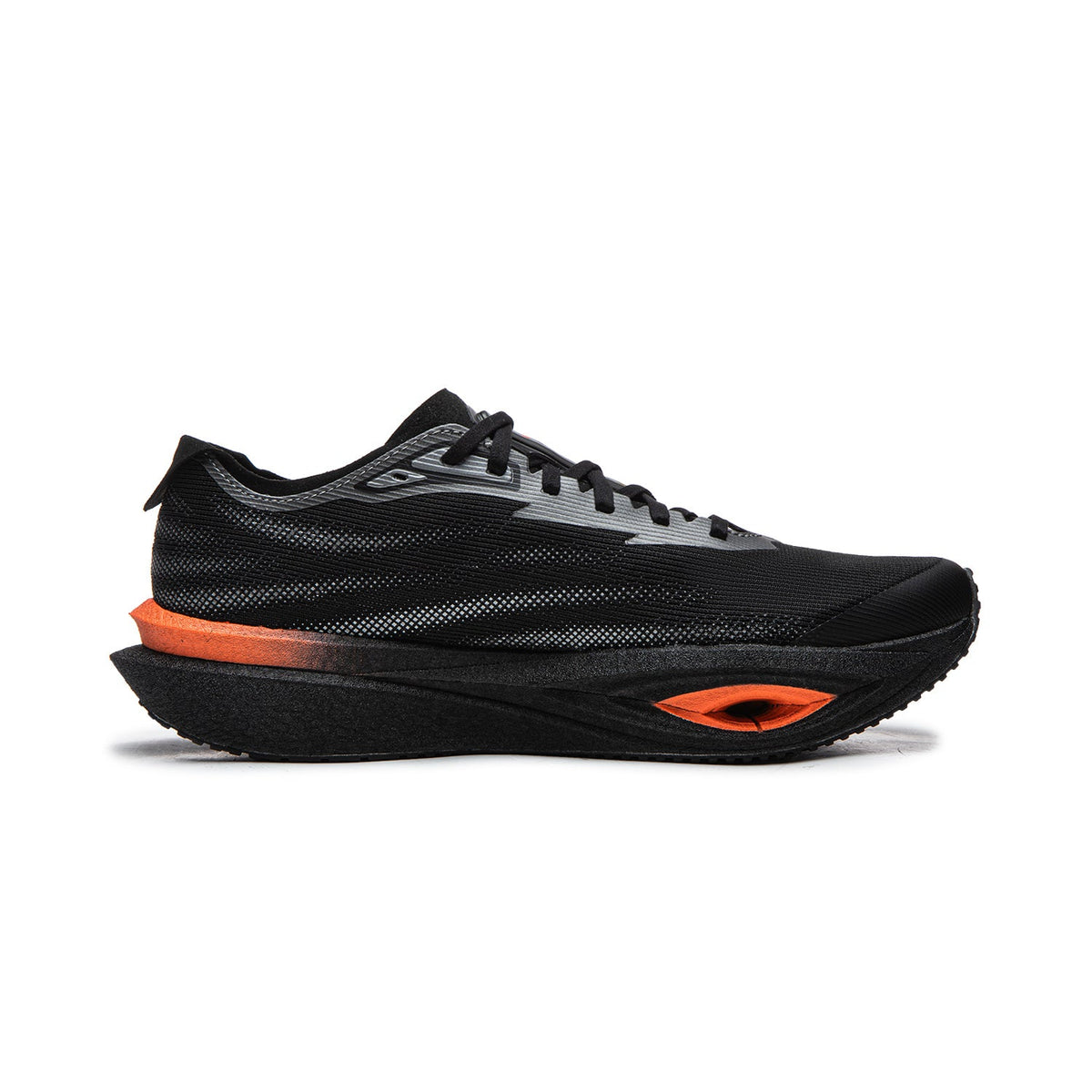 Black running shoe side view with silver accents and orange under-heel panel