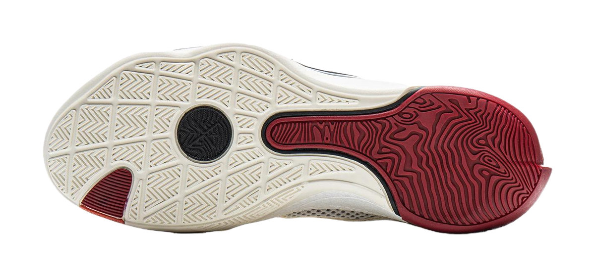Basketball shoe outsole with white traction pattern and red rubber forefoot