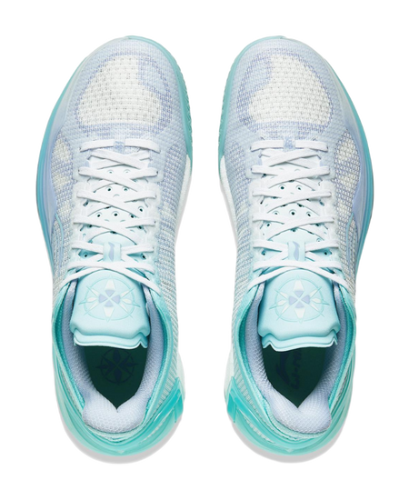 Pair of low-top basketball shoes, light blue knit upper with white laces and teal trim