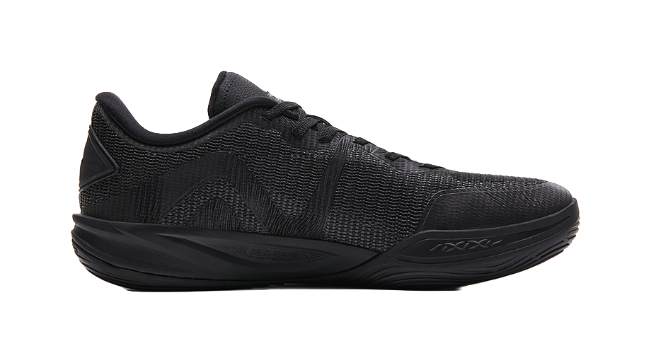 All-black basketball sneaker with textured upper and curved midsole
