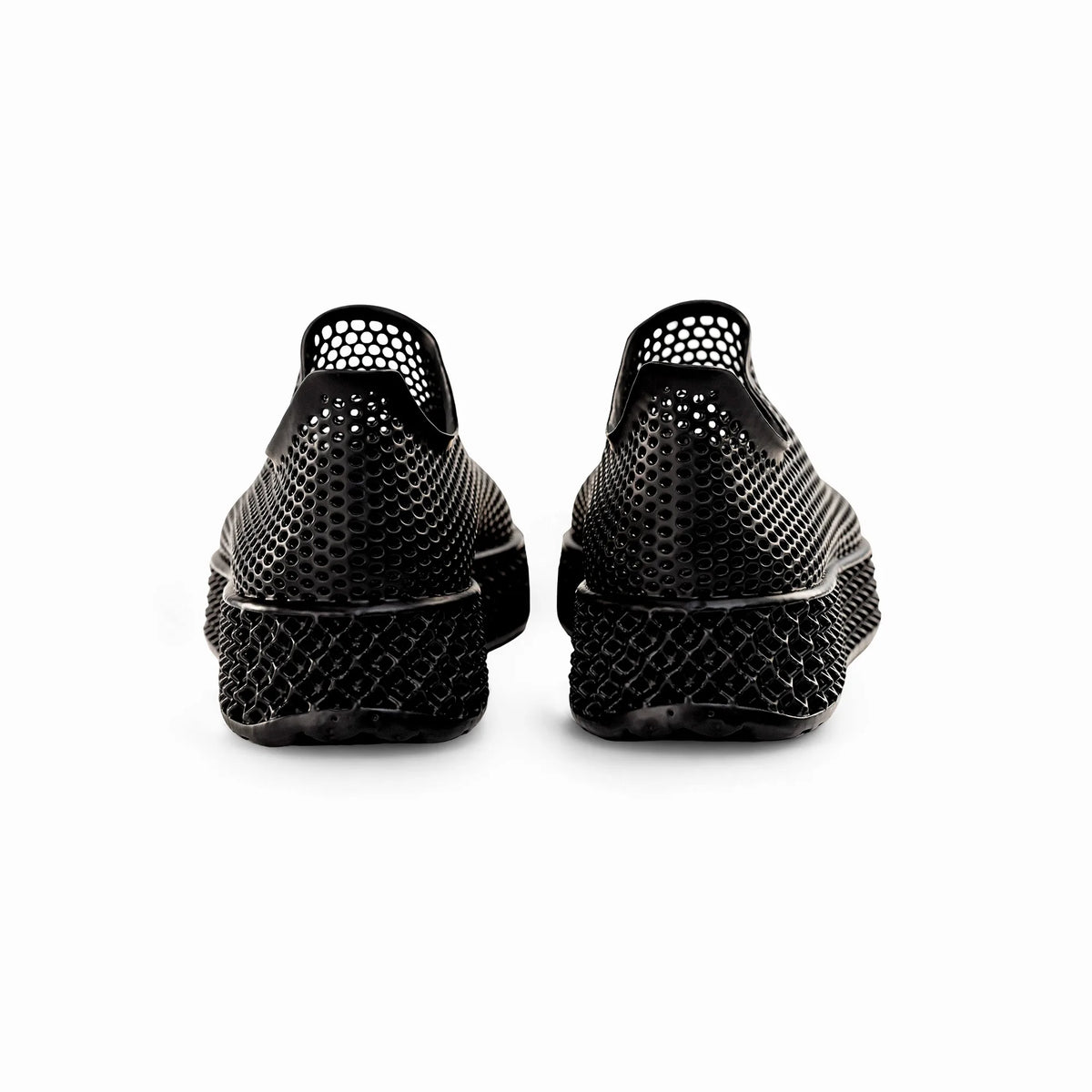 Black 3D-printed sneakers from the back view with perforated heel and cushioned sole