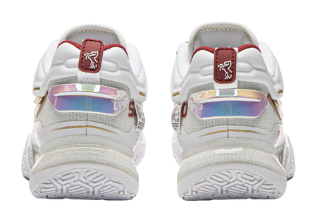 Back view of white and red badminton shoes with heel strap and durable outsole