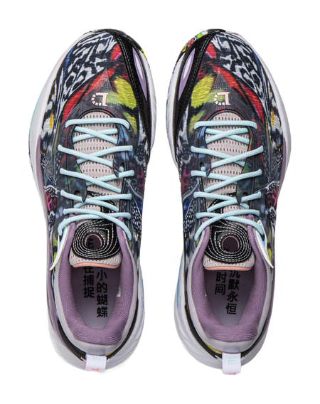 Pair of basketball shoes, multicolor patterned uppers, light blue laces, purple lining