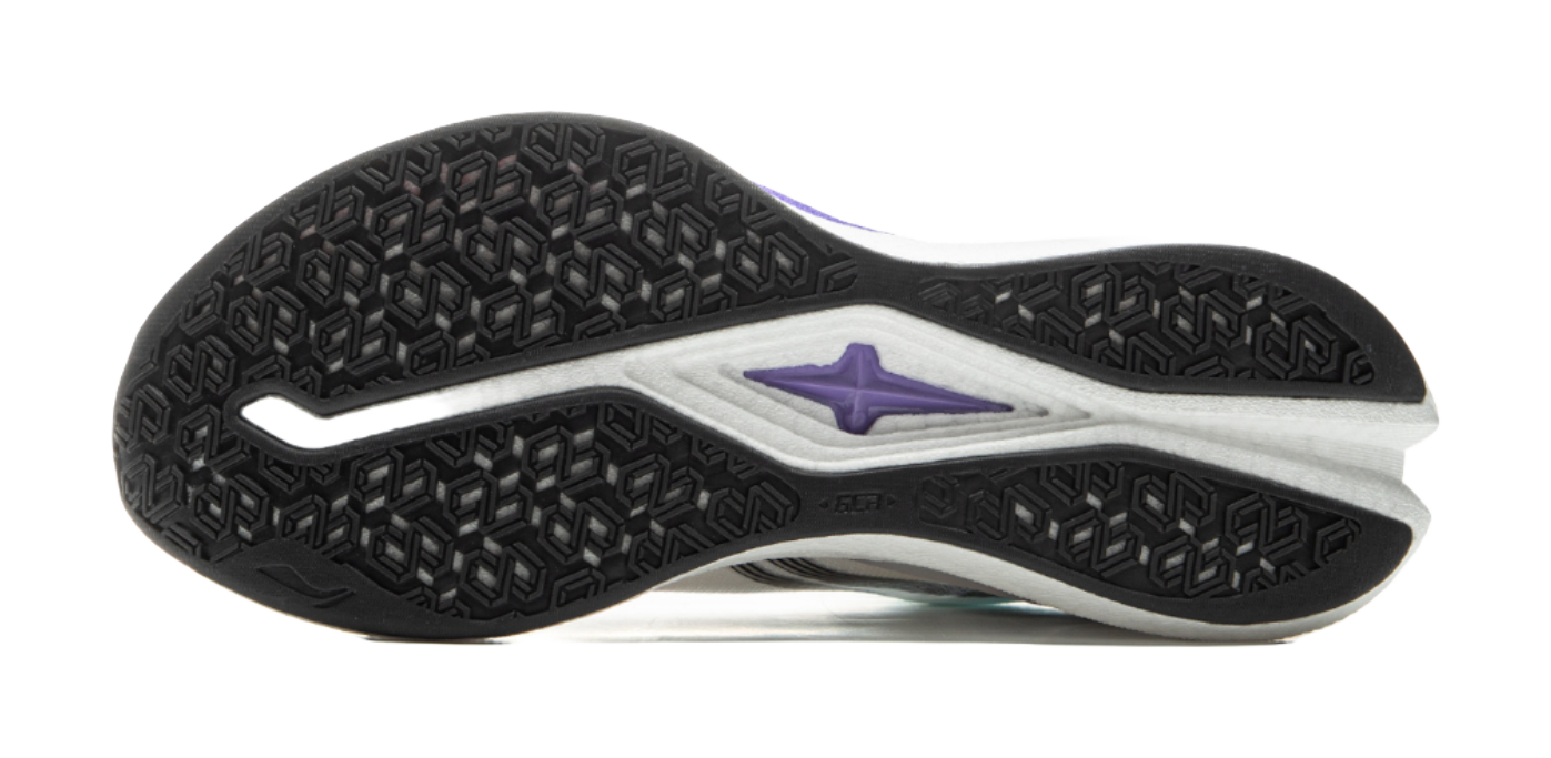 Running shoe outsole with black textured tread and purple star logo on white section