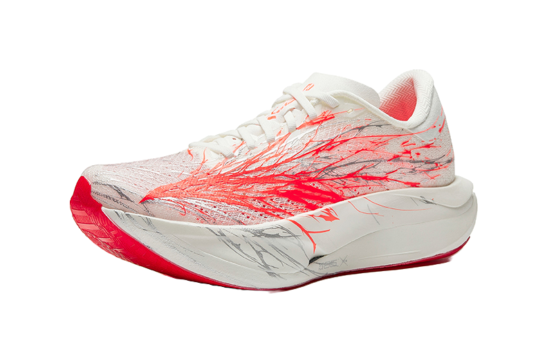 White running shoes with red side swoosh graphics and marbled sole cushioning.