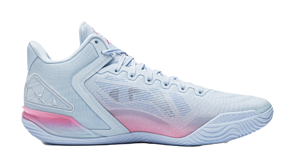 Men's low-top basketball shoe side view, light blue upper with pink trim