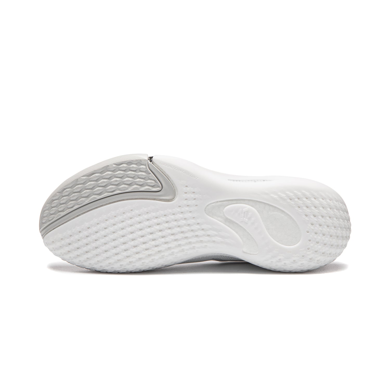 White basketball shoe outsole with textured traction pattern