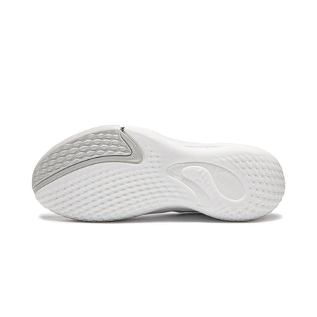 White basketball shoe outsole with textured traction pattern