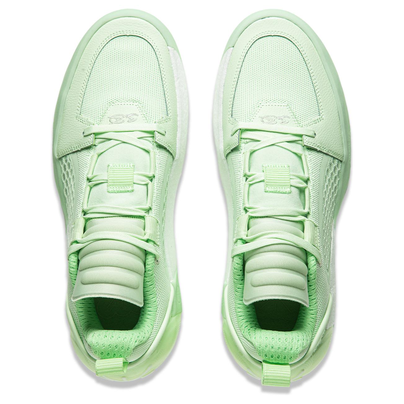 Pair of Agile green basketball shoes, front view, lace-up with padded tongue and collar.