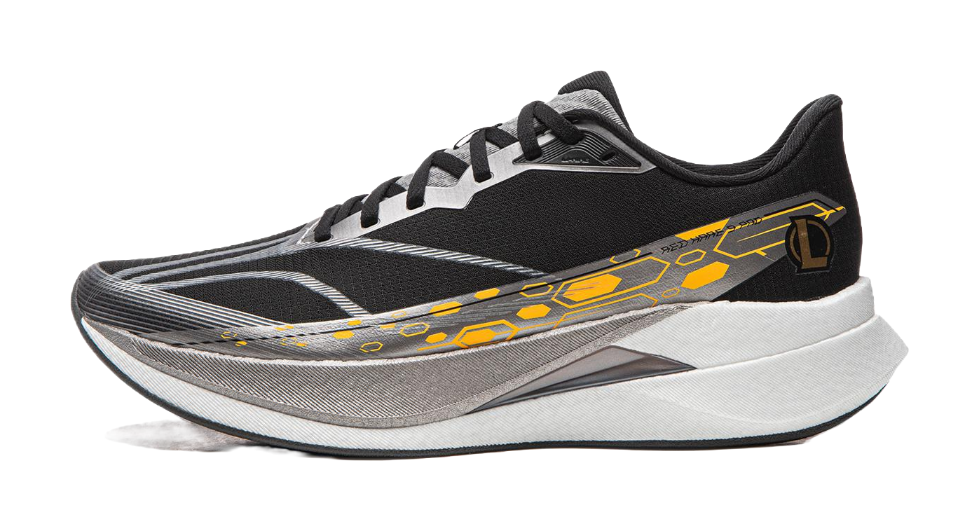 Black running shoe with white-gray sole and yellow-orange side graphic, lace-up.